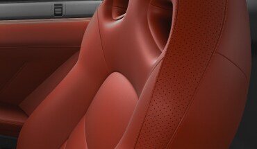 Vue intérieure de la Nissan GT-R montrant le siège avec garnitures en cuir semi-aniline.