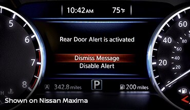 Nissan LEAF 2023 montrant l’avertisseur de portière arrière